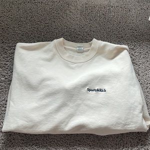 Sporty and Rich oversized cream sweater
